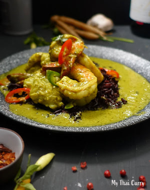 Mixed seafood in Thai green curry paste with black rice